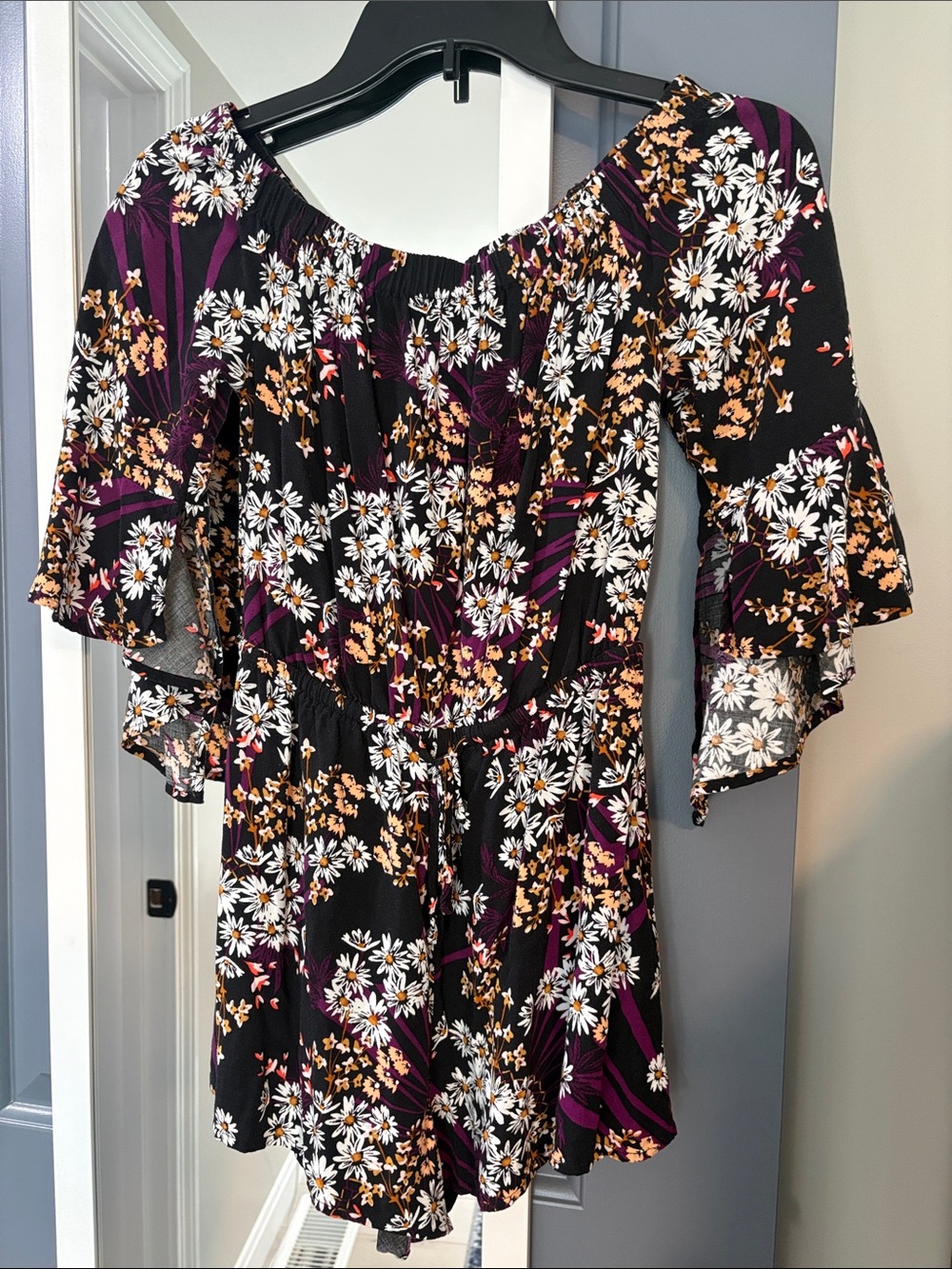 Express Black Floral Off-Shoulder Mini Romper with Purple Accents